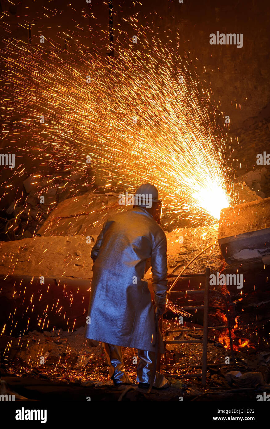 welder cut metal  in steel plant Stock Photo