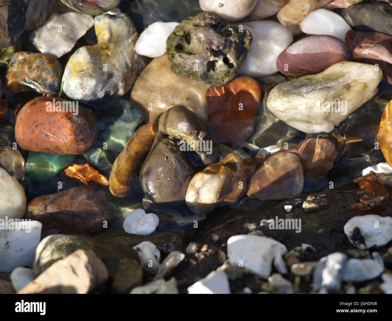 Ancient Stream Bed Rounded Rocks rocks and pebbles on a stream bed Stock Photo - Alamy