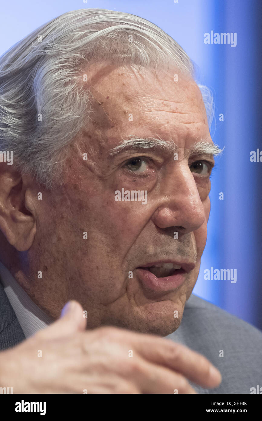 Mario Vargas Llosa and his son, Alvaro Vargas Llosa, pose during the ...