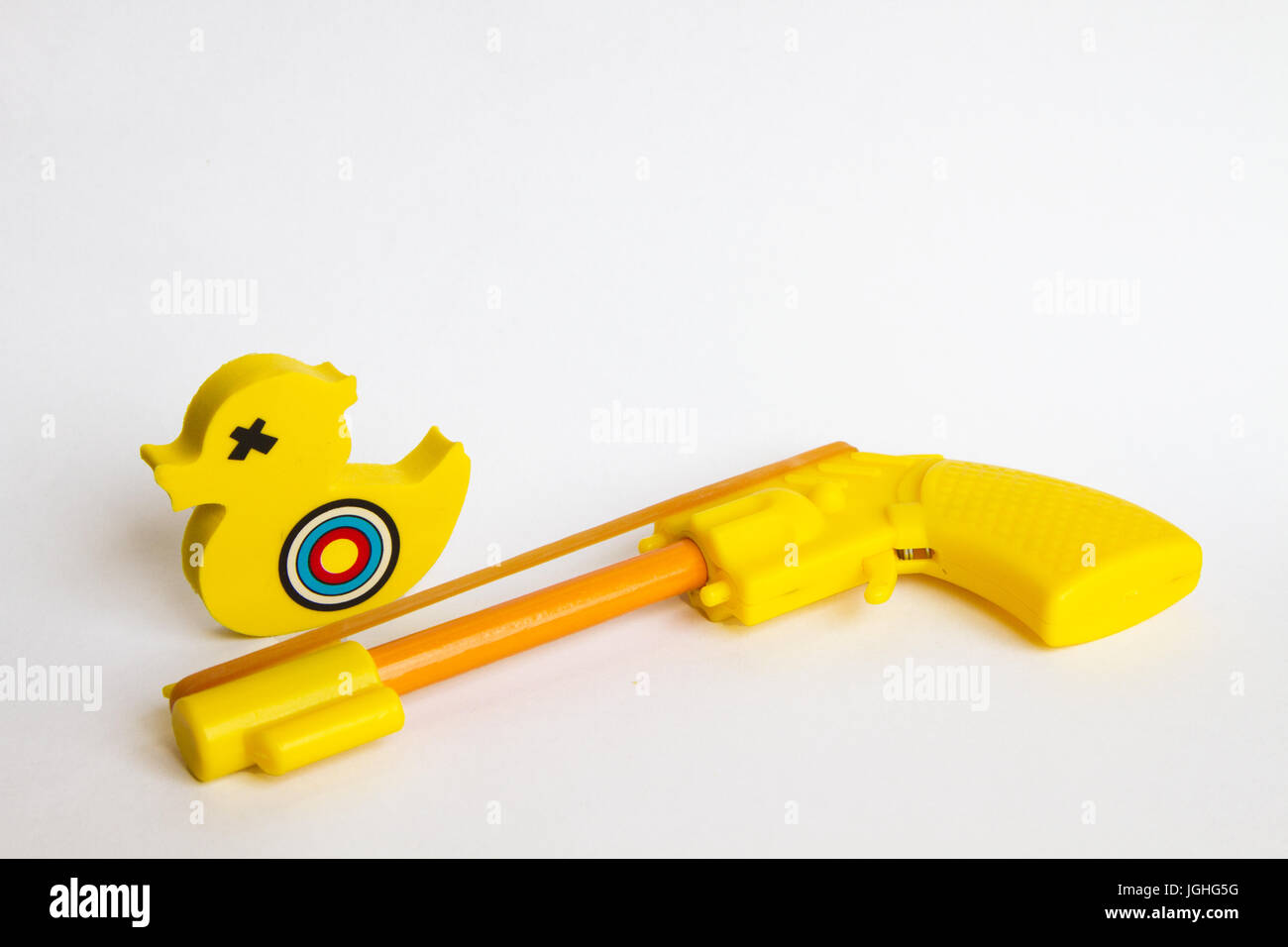 Shooting Yellow Duck erasers with targets on them Stock Photo