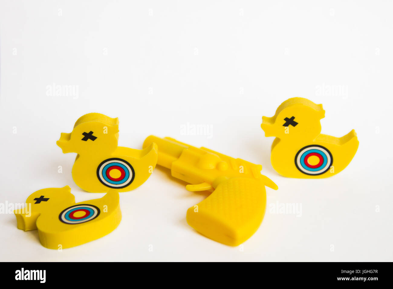 Shooting Yellow Duck erasers with targets on them Stock Photo