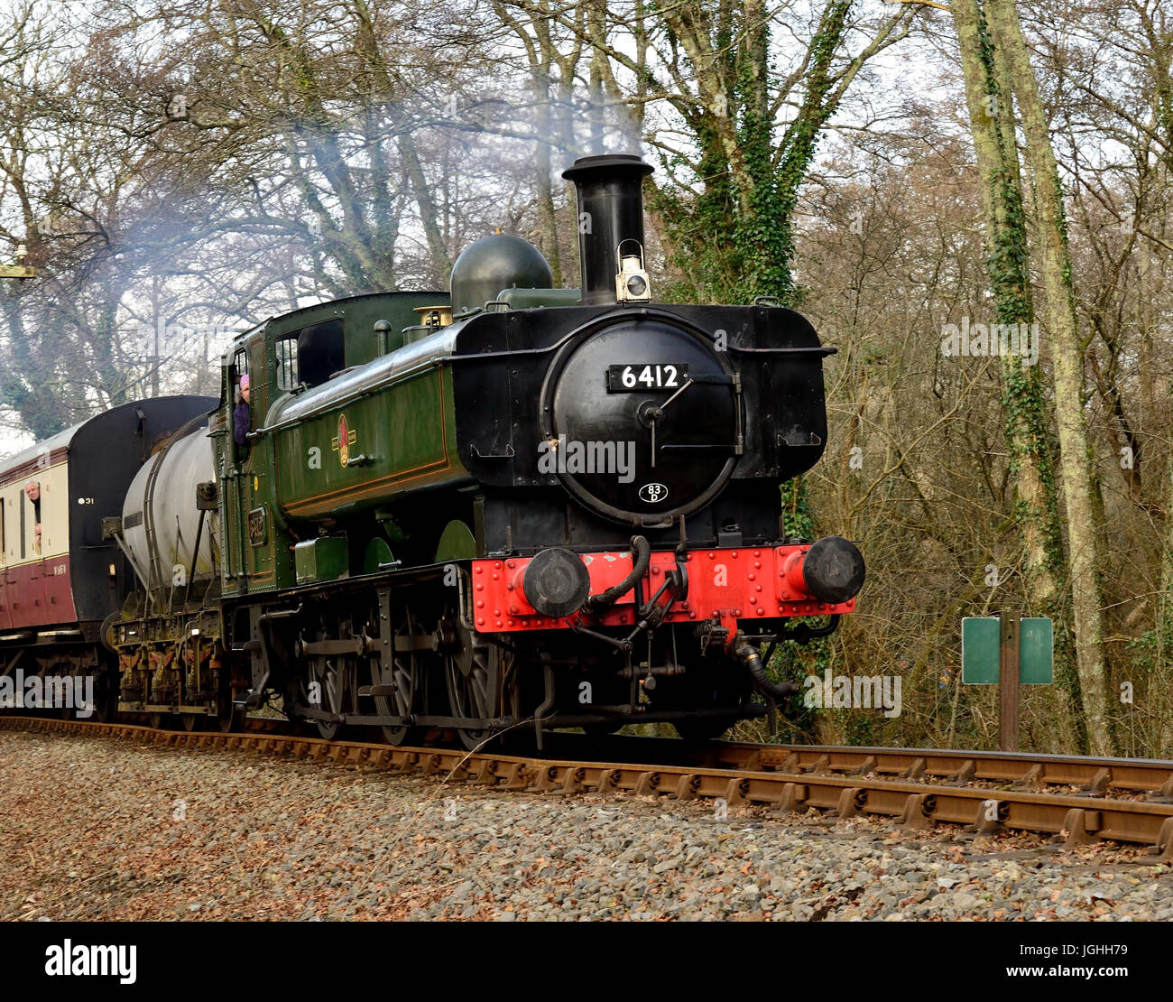 GWR 0-6-0 pannier tank loco No 6412 hauling a steam train on the South Devon Railway. Stock Photo