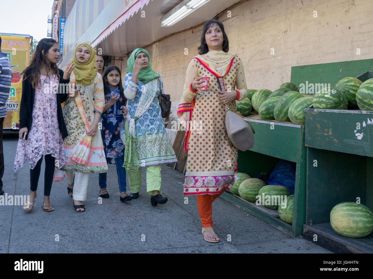 South Asian women walking on 73rd Street in Jackson Heights, Queens, New York City. Stock Photo