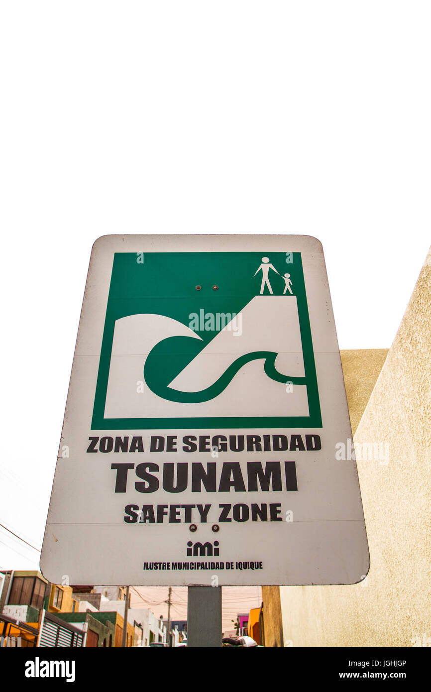 Sign indicating safe zone in case of tsunami. Iquique, Tarapaca Region, Chile. 16.11.15 Stock Photo