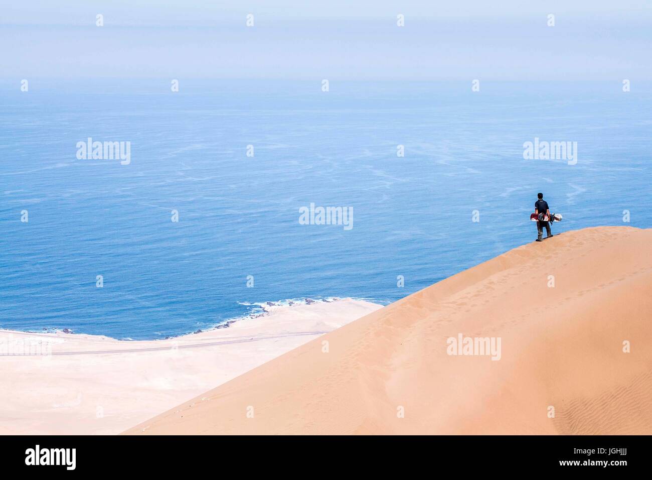 man looking at the view from Alto los Verdes, . Iquique, Tarapaca Region, Chile 19.11.15 Stock Photo