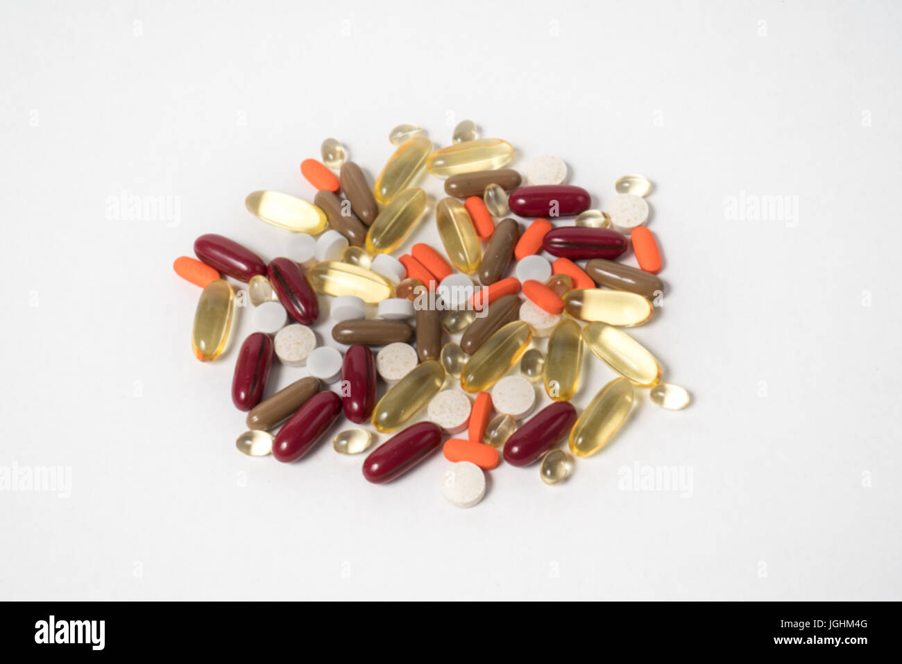 Variety of vitamins and nutritional supplement pills. Stock Photo