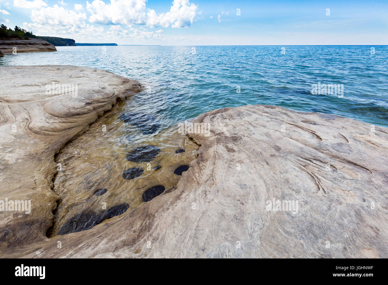 'The Coves' on Lake Superior at Pictured Rocks National Lakeshore, located in Munising Michigan. The Coves are part of the Beaver Basin Lake area. Stock Photo