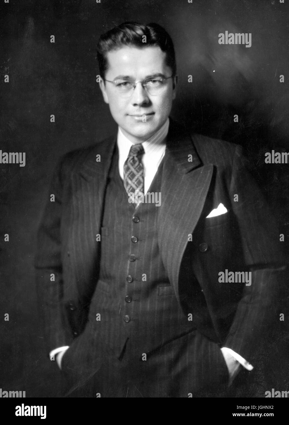 Half length standing portrait of biostatistician and professor John William Fertig, 1940. Stock Photo