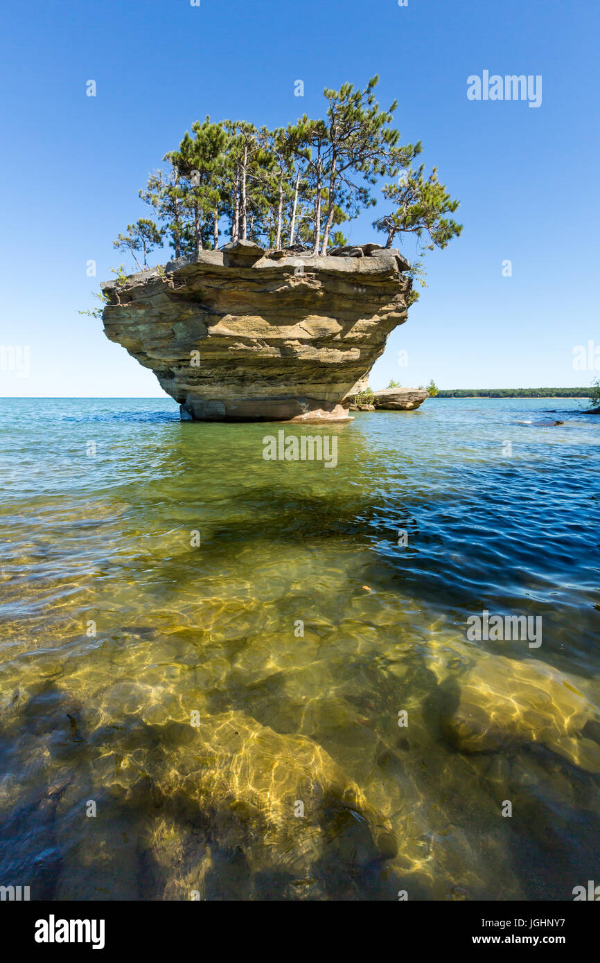Turnip Rock on Lake Huron in Port Austin Michigan. An underwater view shows rocks under the clear surface of the water Stock Photo
