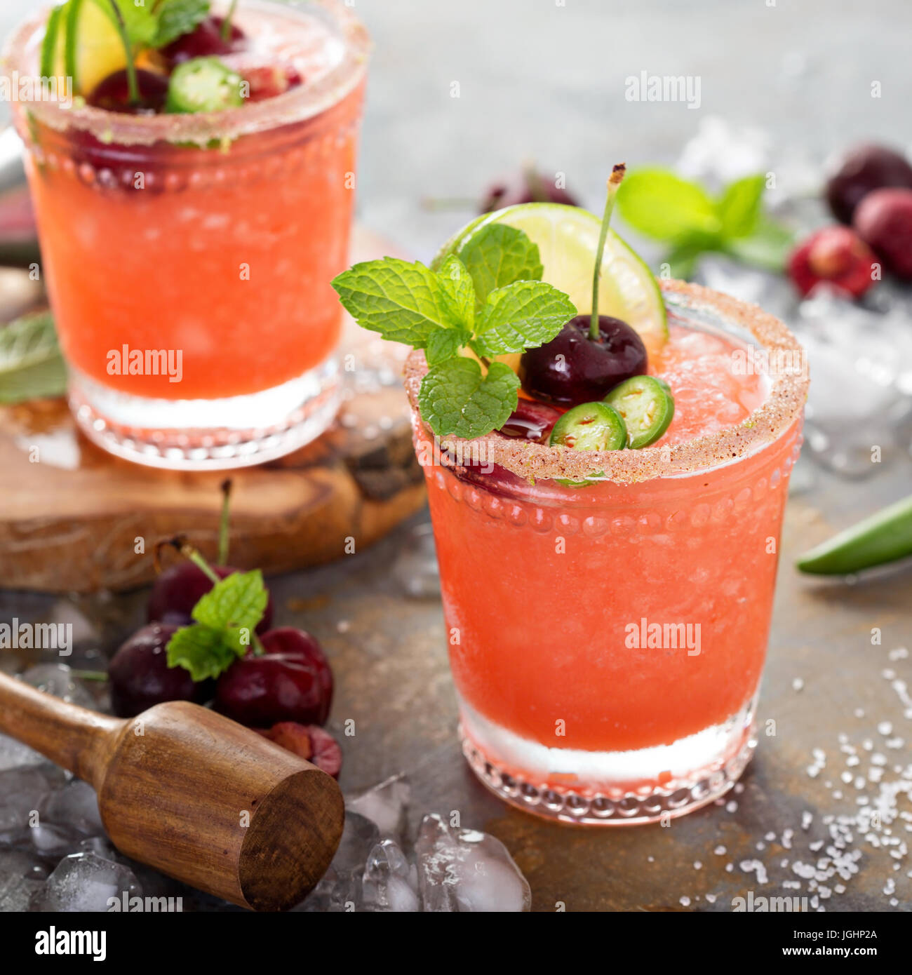 Refreshing summer cocktail with cherry Stock Photo