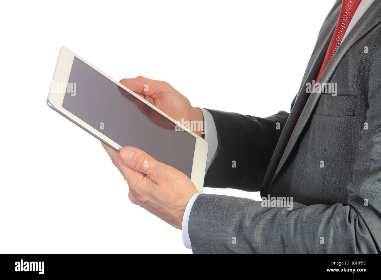 Businessman hold white tablet close-up. Man in gray suit use new tablet isolated on white background. Stock Photo