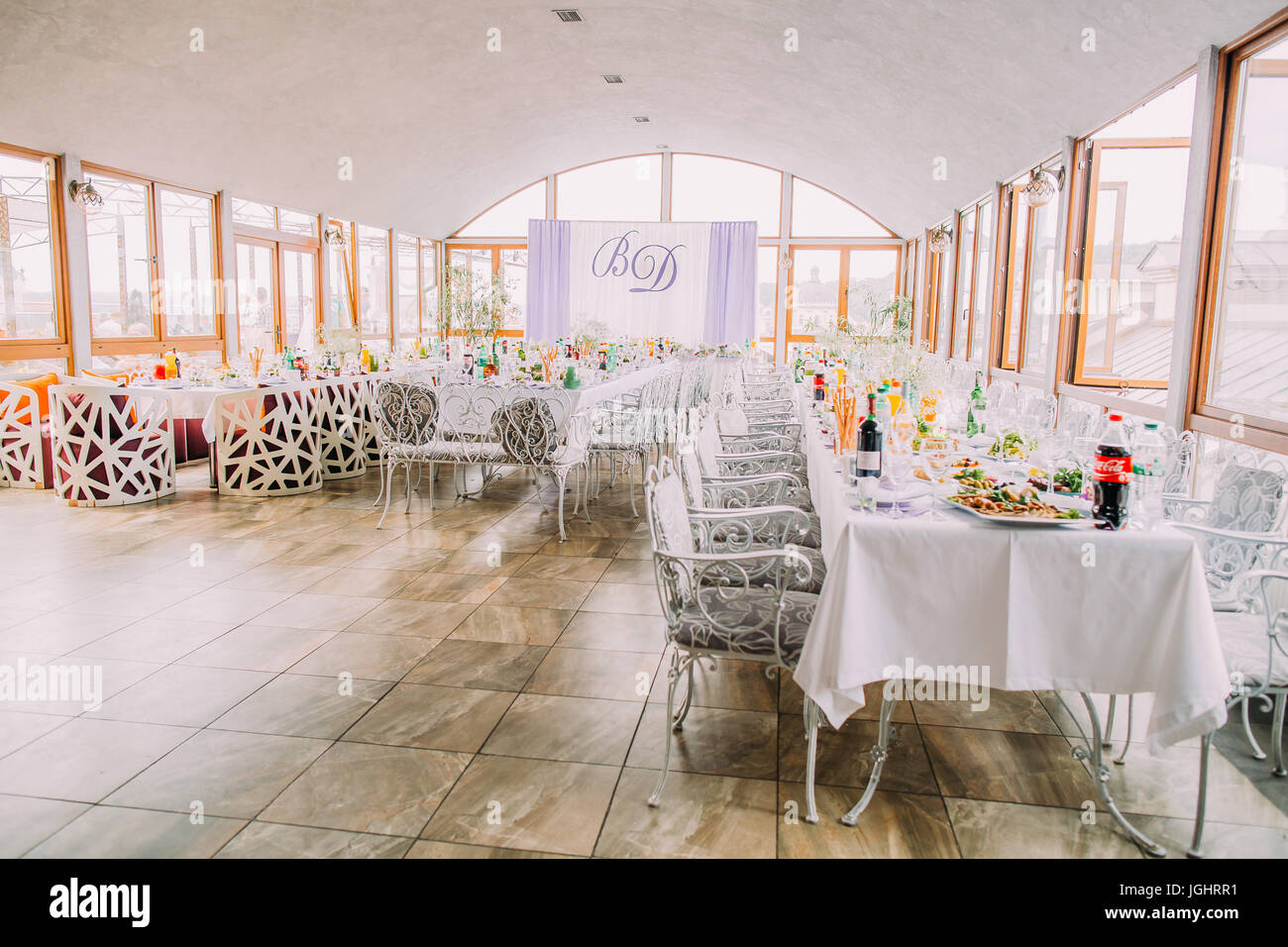 Lovely decorated restaurant for wedding party. Stock Photo