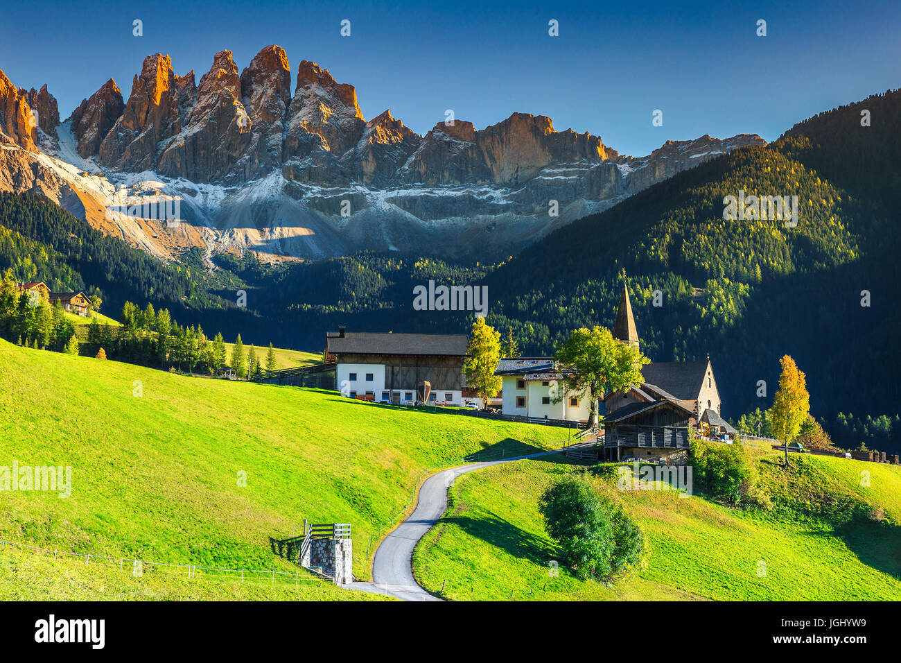 Fabulous best alpine place of the world, Santa Maddalena village with magical Dolomites mountains in background, Val di Funes valley, Trentino Alto Ad Stock Photo