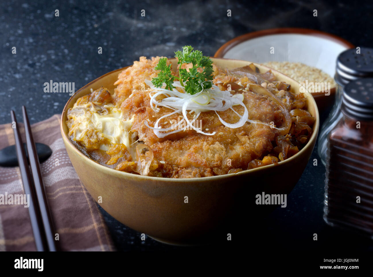 Katsudon or Japanese style fried pork roast with eeg and Japanese