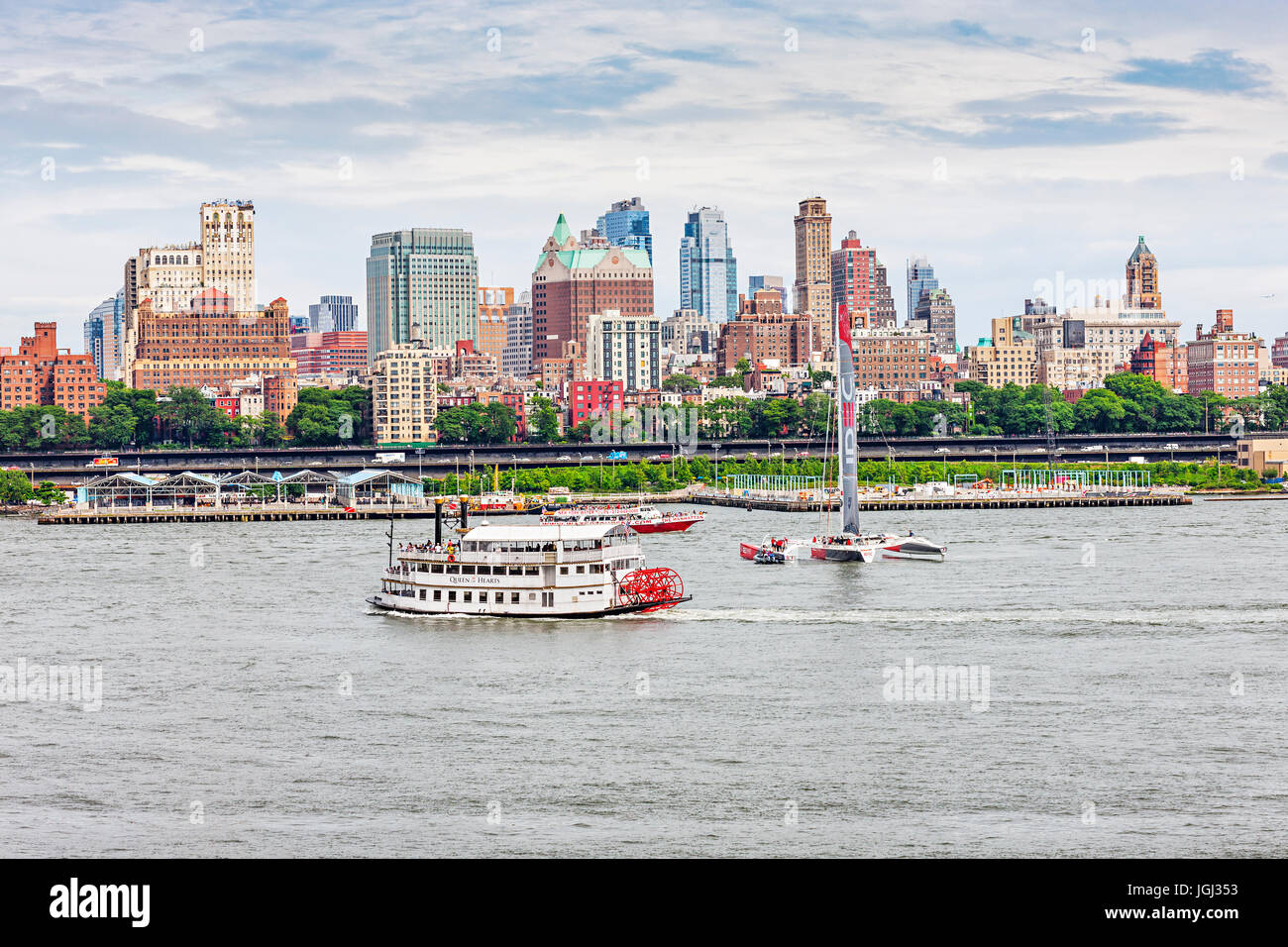 Brooklyn skyline, yellow ferry boat sails on East River, New York City Stock Photo