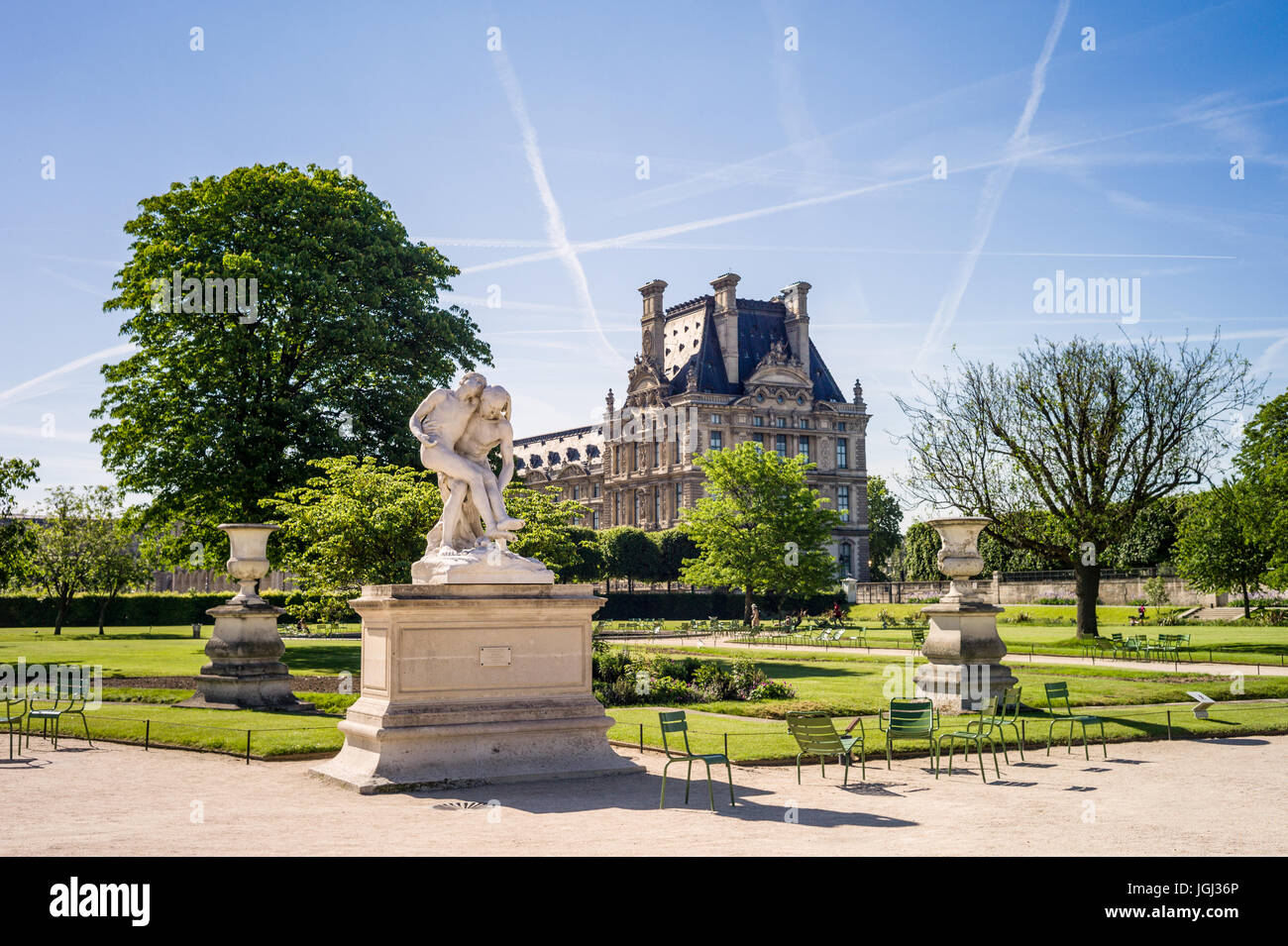 The Tuileries garden in Paris, France, by a sunny morning with the statue of the Good Samaritan and the Flore pavilion of the Louvre palace. Stock Photo