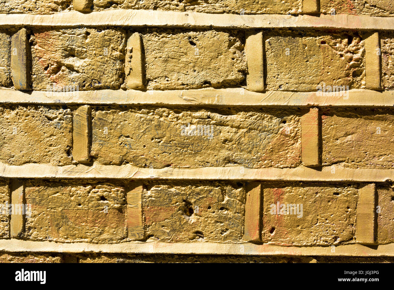 A golden brick wall in London Stock Photo