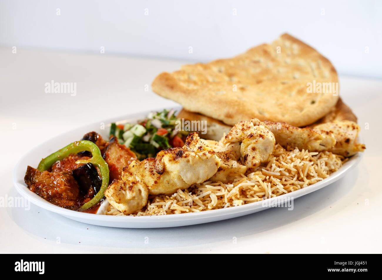 kabob dinner w/ rice and sides Stock Photo Alamy