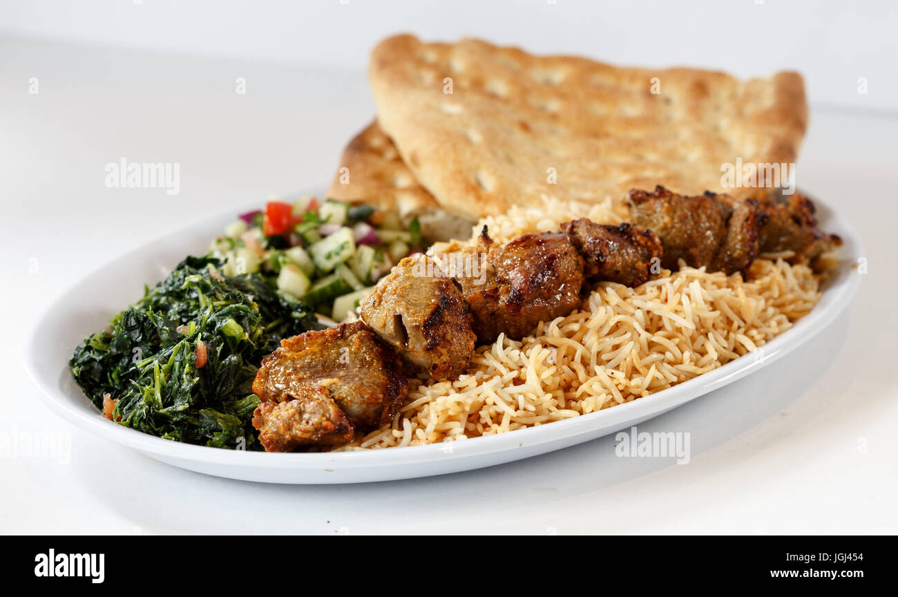 kabob dinner w/ rice and sides Stock Photo Alamy