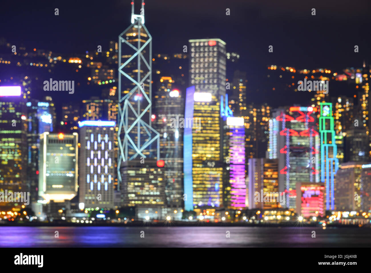Cityscape of Hong Kong at night with blurred for background Stock Photo ...