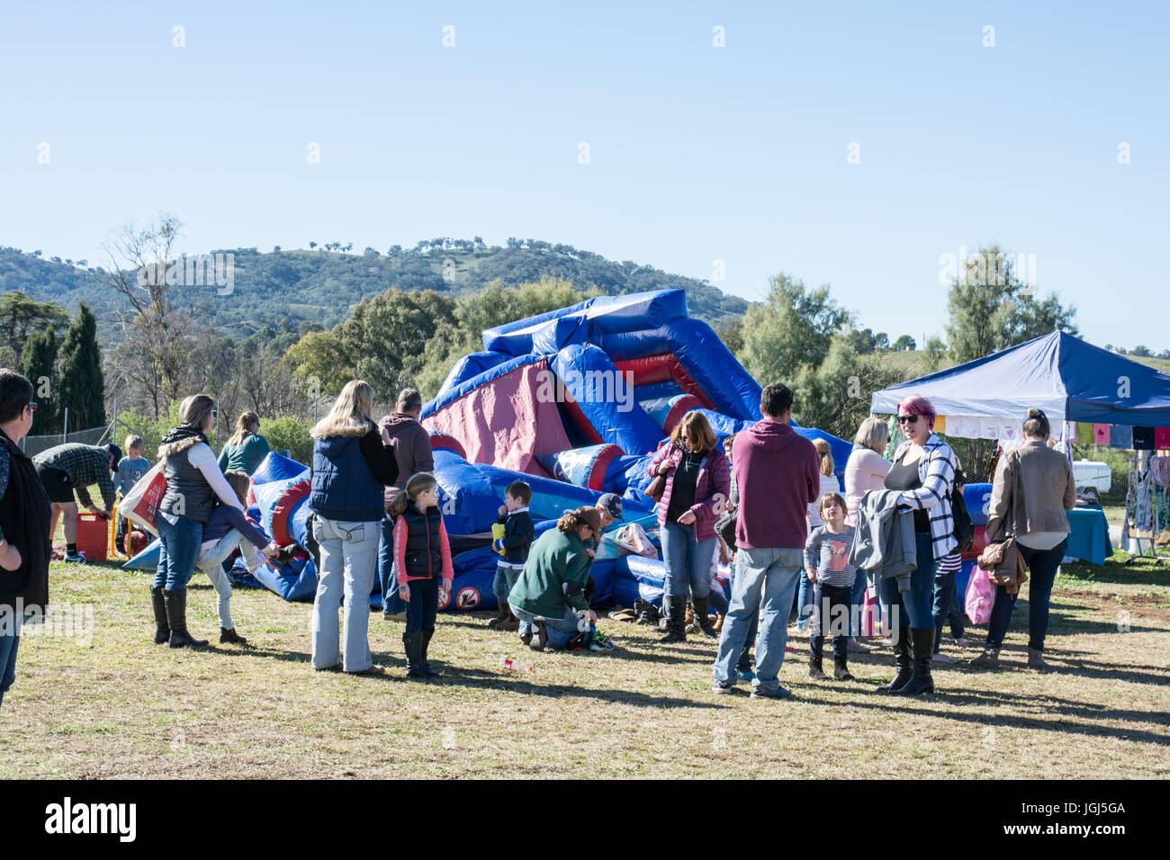 Jumping Castle Collapsed at a country fair NSW Australia.Children and Parents waiting for repair. Stock Photo