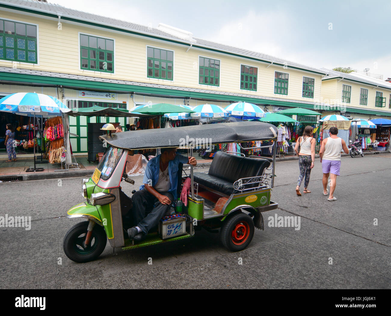 Bangkok, Thailand - Jul 30, 2016. Tuk tuk (taxi) running on street in Bangkok, Thailand. Tuk-tuks or sam lor (three-wheeled) used to be everyone's fav Stock Photo