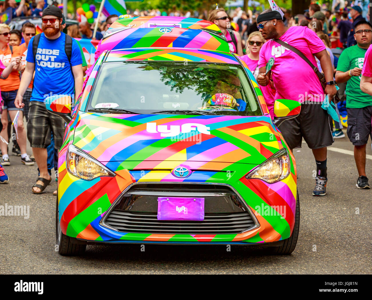 Portland, Oregon, USA - June 18, 2017: Lyft in Portland's 2017 Pride Parade, which reflects the community diversity. Stock Photo