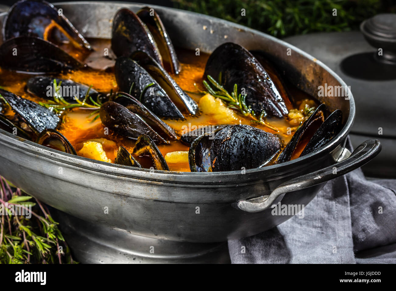 Seafood mussels tomato soup in metal pot Stock Photo Alamy