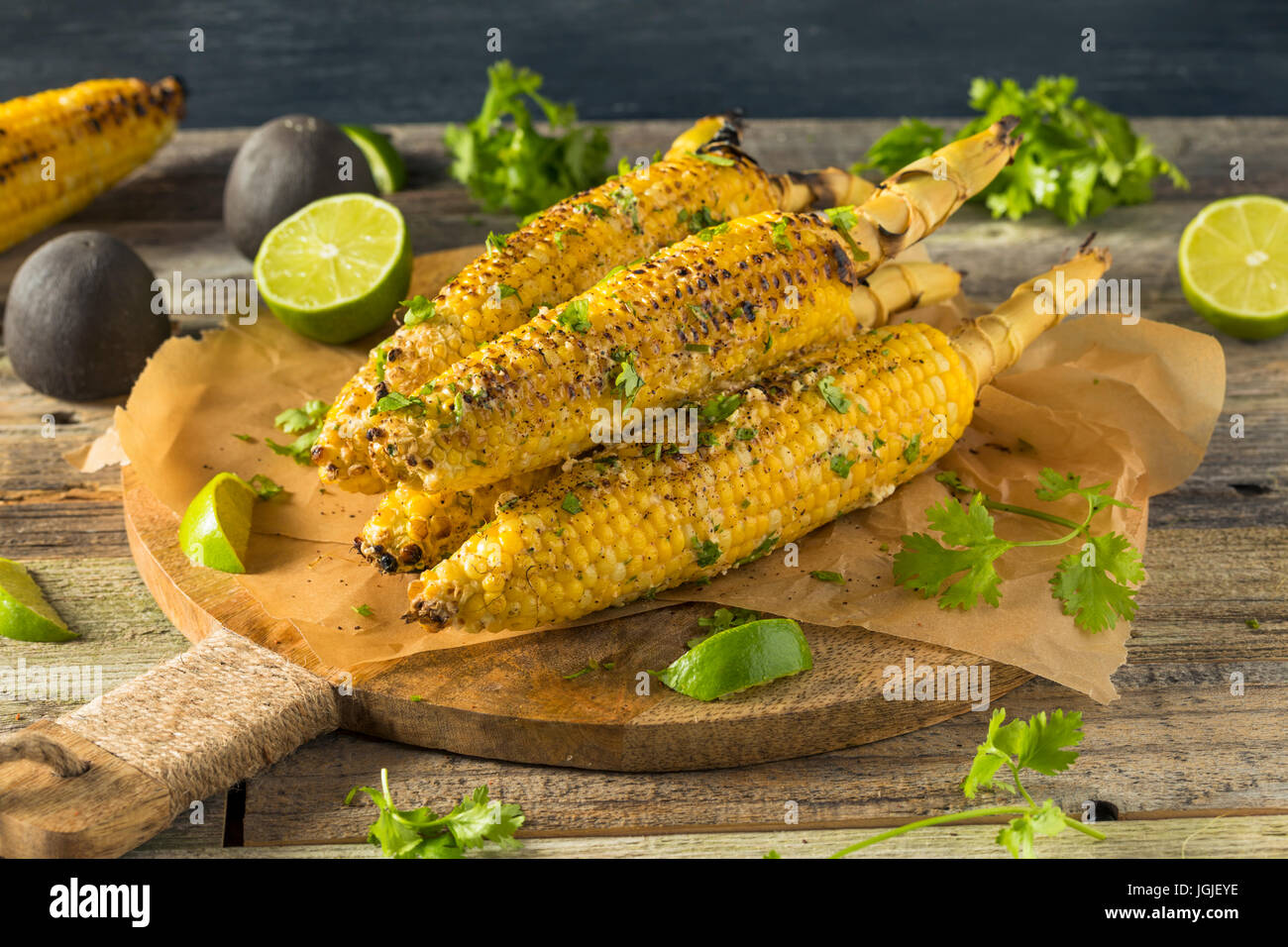 Barbecued Homemade Elote Mexican Street Corn with Mayo and Chili Powder Stock Photo