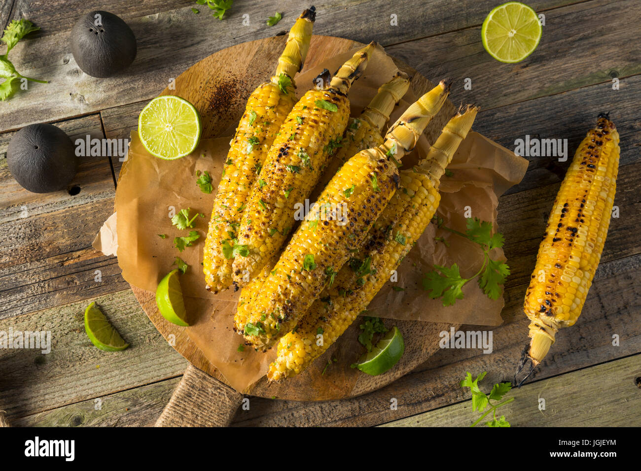 Barbecued Homemade Elote Mexican Street Corn with Mayo and Chili Powder Stock Photo