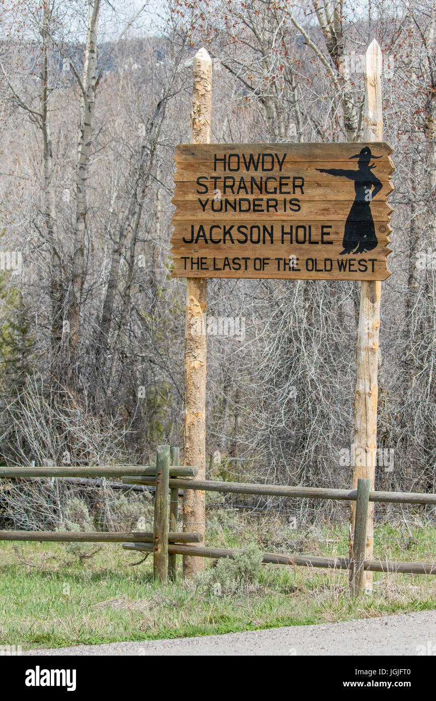 Old West sign welcoming strangers to Jackson Hole near ranch Stock Photo