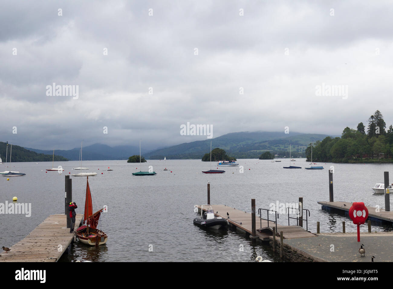Cumbria, UK. 7th July, 2017. Lake Windermere Clouds over the fells above Lake Windermere