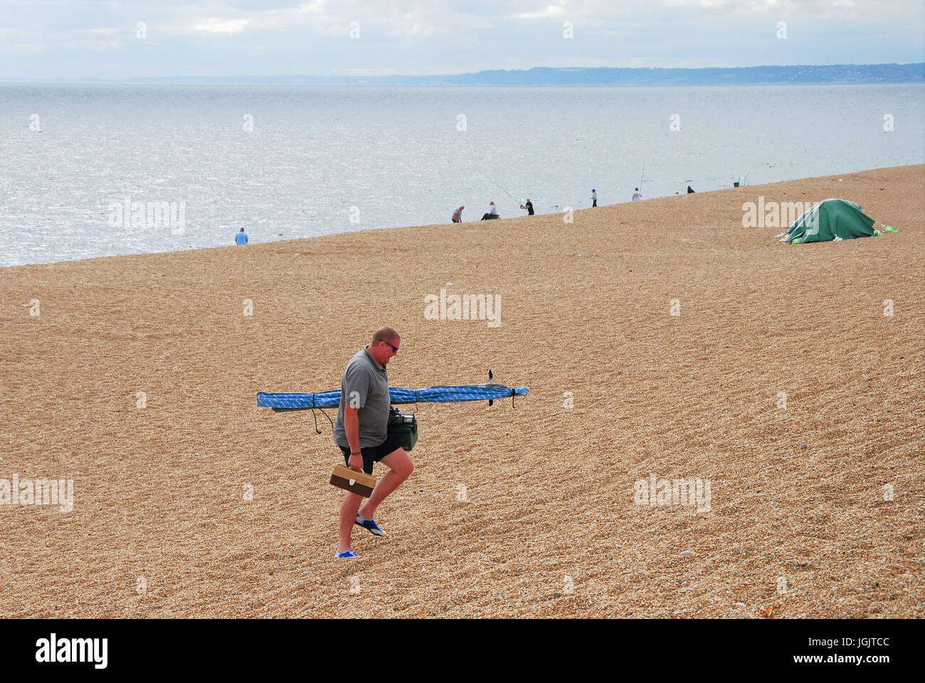 Chesil Beach, Dorset, UK. 7th July, 2017. People enjoy fishing on a