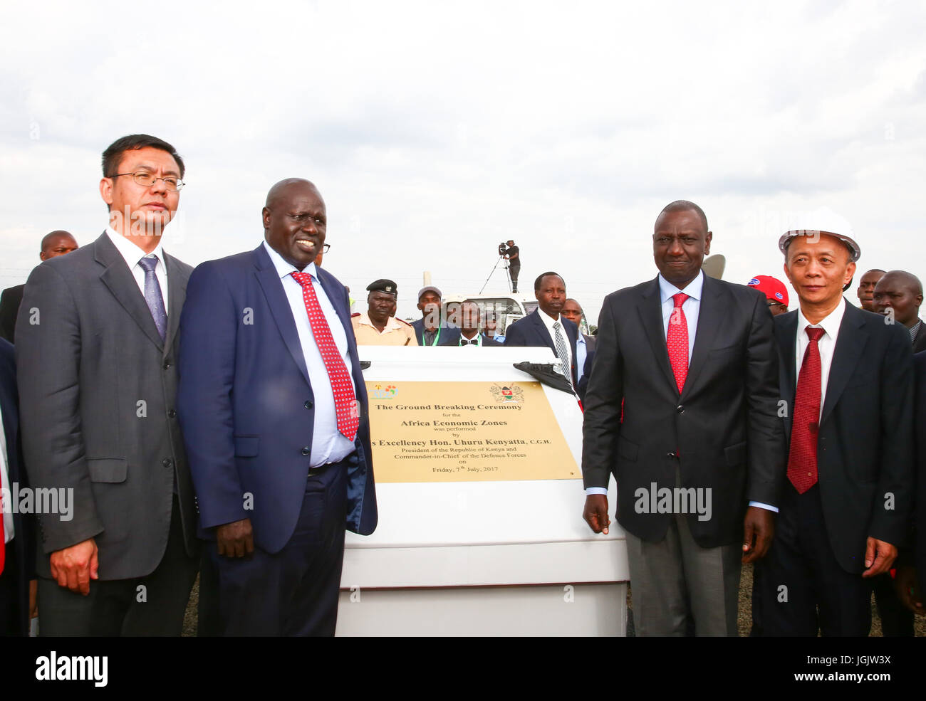 (170707) -- ELDORET(KENYA), July 7, 2017 (Xinhua) -- Kenyan Deputy President William Ruto (2nd R, front), Counsellor of the Chinese Embassy in Kenya Yao Ming (1st L, front) and other guests unveil a commemorative plaque at the launching ceremony of the Special Economic Zone project in Eldoret, Kenya, on July 7, 2017. Kenya on Friday launched a Special Economic Zone (SEZ) project that is expected to attract about 2 billion U.S. dollars of foreign investments. The project is a joint venture between Kenyan-based company Africa Economic Zone and China's Guangdong New South Group. (Xinhua/Pan Siwei Stock Photo