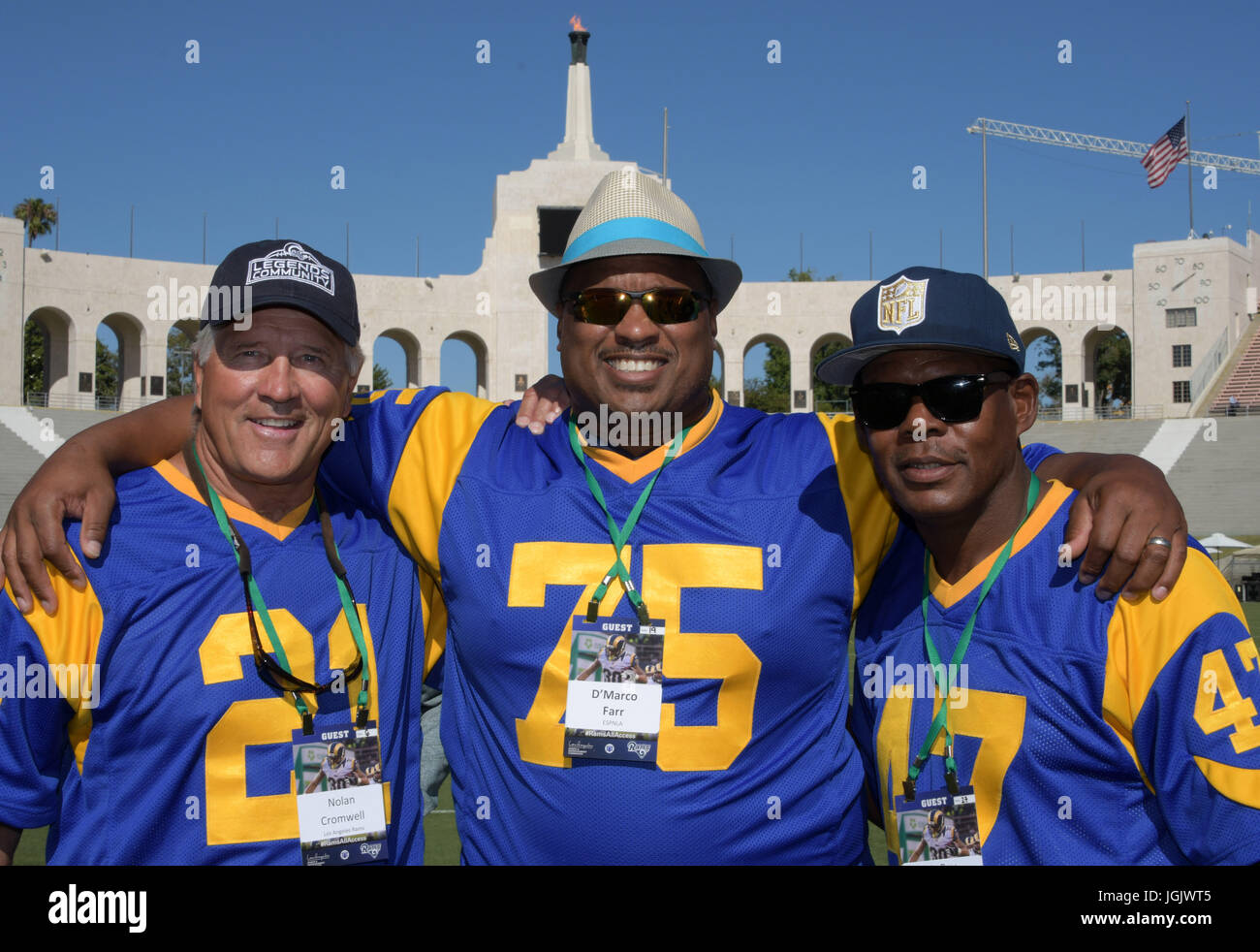 Los Angeles Rams former defensive back Nolan Cromwell (21), St. Louis Rams  former defensive tackle D'Marco Farr (75) and Los Angeles Rams former  defensive back LeRoy Irvin (47) pose at Rams All-Access