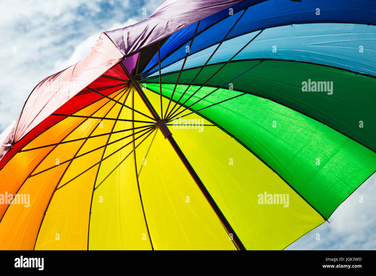 Bristol, UK. 8th July, 2017. Rainbow umbrella being carried at the Bristol Pride Festival. Credit: Elizabeth Nunn/Alamy Live News. Stock Photo