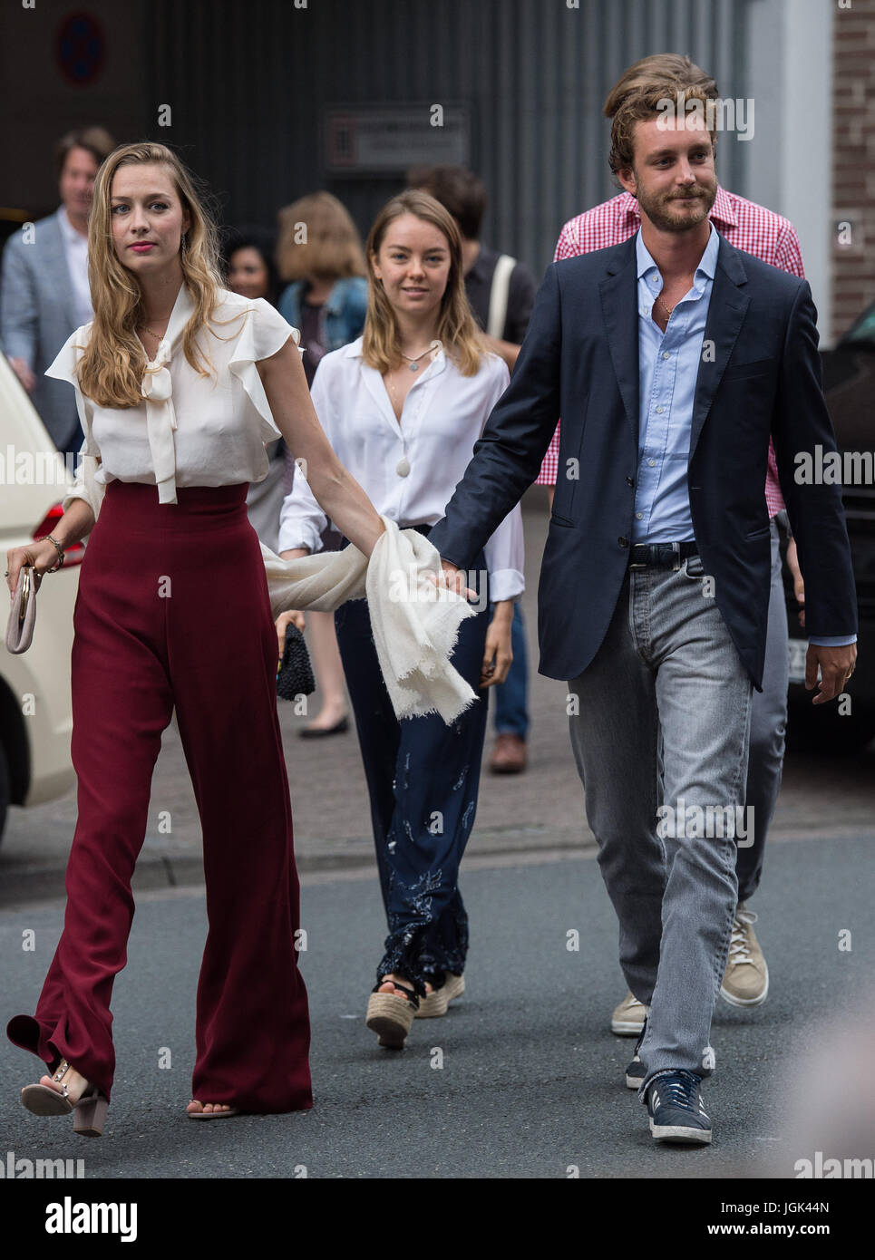Pierre Casiraghi, son of Princess Caroline, his wife, Duchess Beatrice Boromeo (l) and his sister Princess Alexandra of Hanover arrive at the Brauhaus Ernst August berwery in Hanover, Germany, 7 July 2017. Prince Ernst August of Hanover of the House of Welf celebrates his wedding-eve party at the brewery. Photo: Silas Stein/dpa Stock Photo