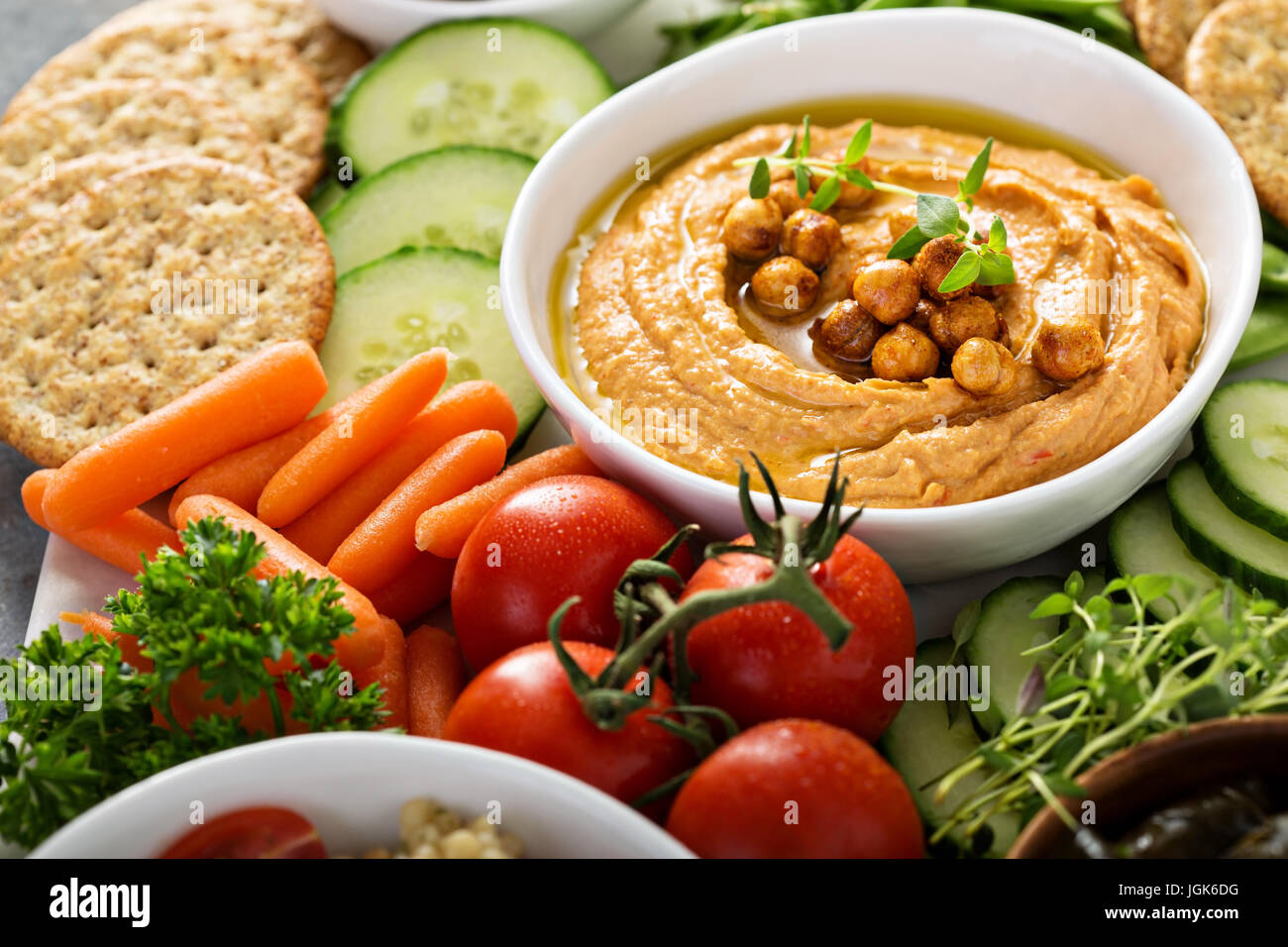 Hummus and vegetables platter with grain salad Stock Photo Alamy