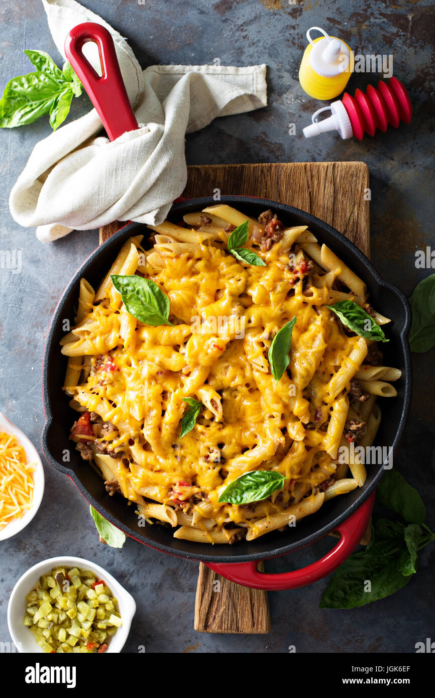 Cheesy pasta bake with ground beef and herbs Stock Photo Alamy