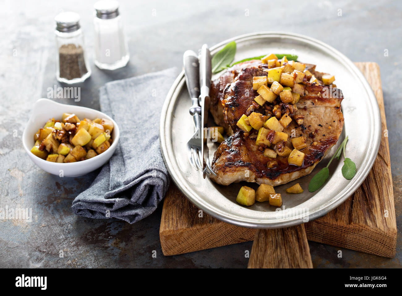 Pork chops with apples and walnuts Stock Photo Alamy