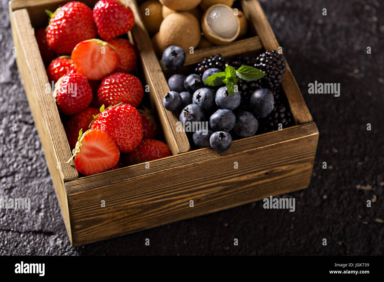 Fresh fruits in wooden box Stock Photo - Alamy