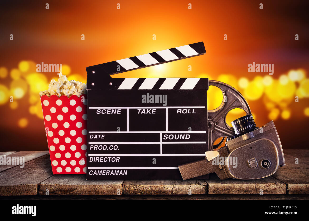 Retro film production accessories placed on wooden planks. Concept of