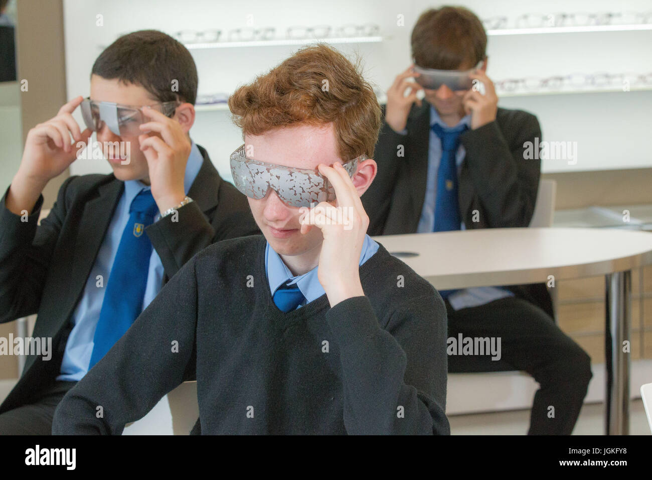 Students experiencing what it is like to have a visual impairment Stock Photo