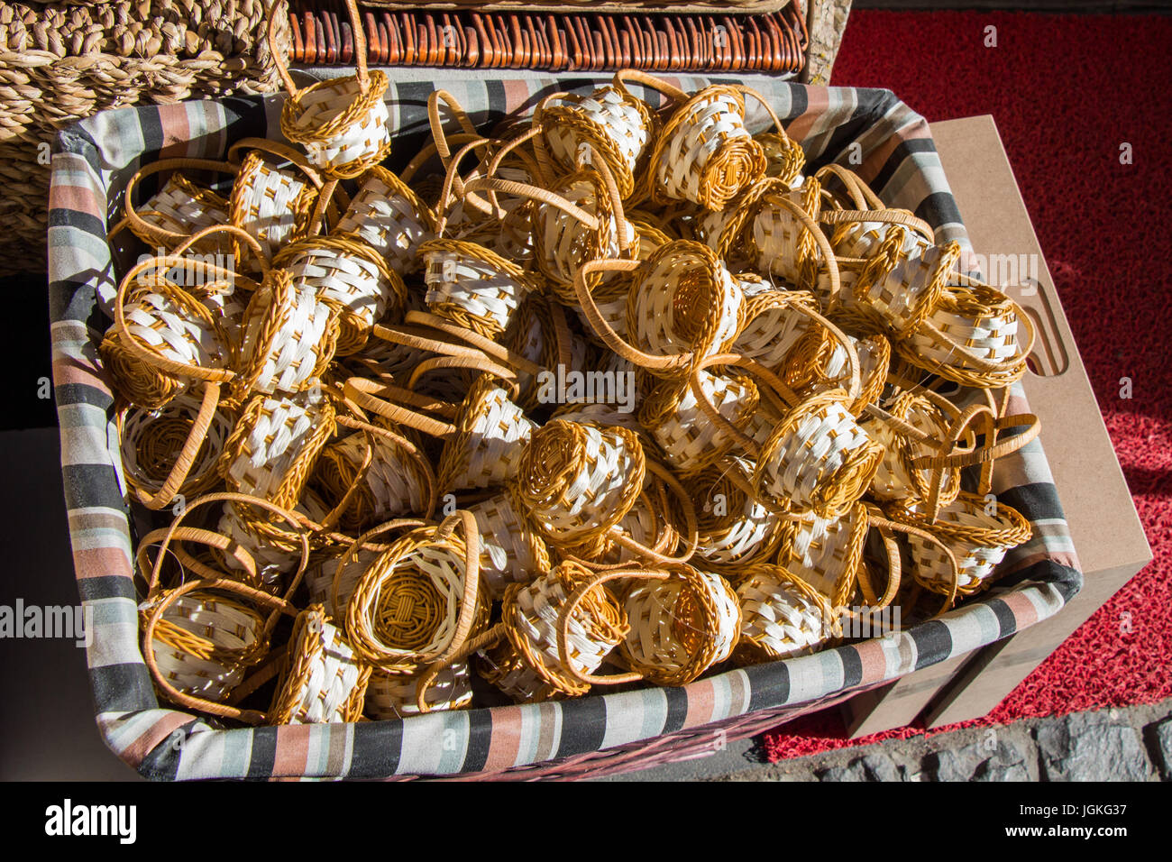 Empty wicker baskets are for sale in a market place Stock Photo - Alamy