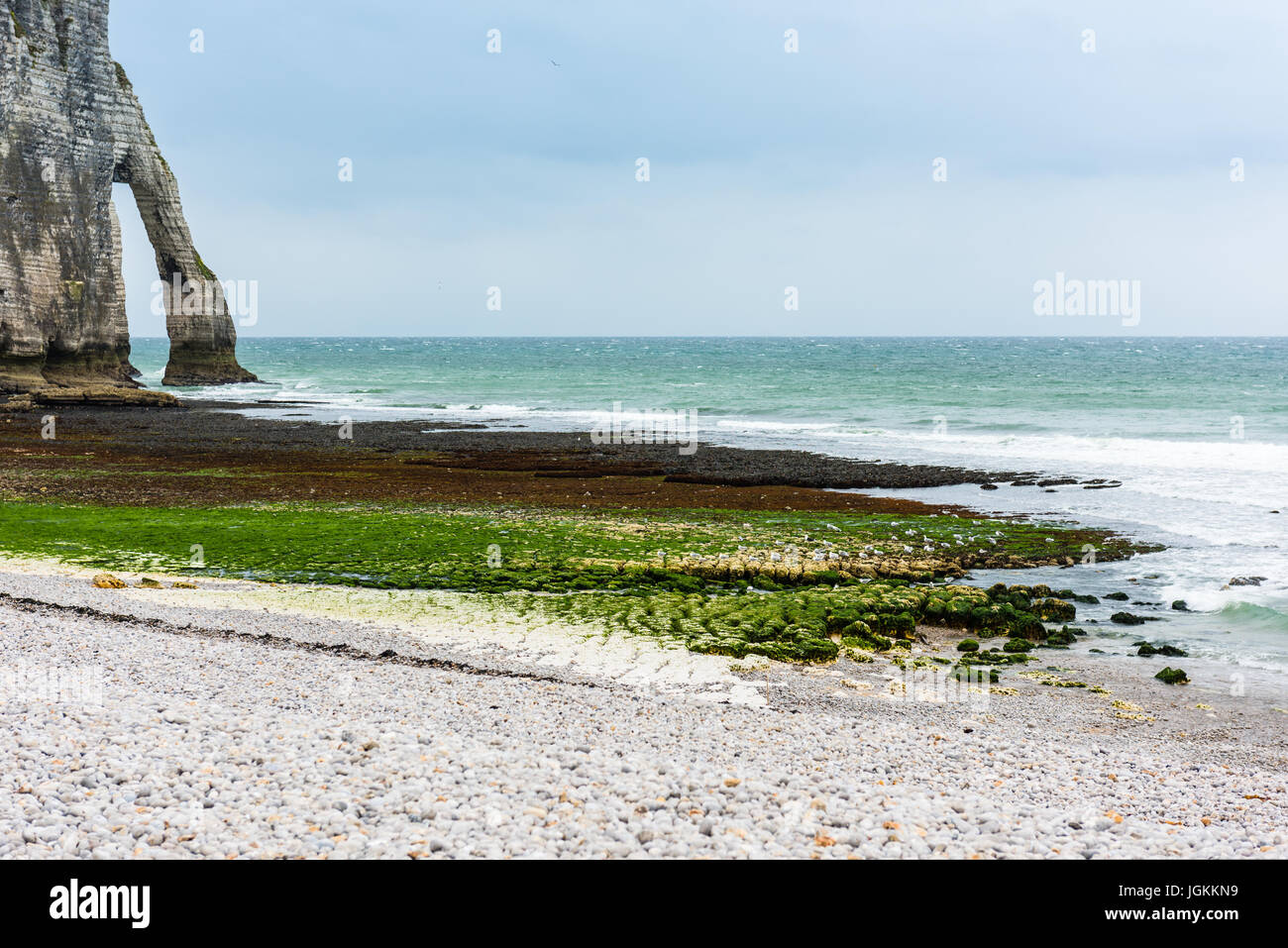 The beach and stone cliffs in Etretat, France, Normandy Stock Photo - Alamy