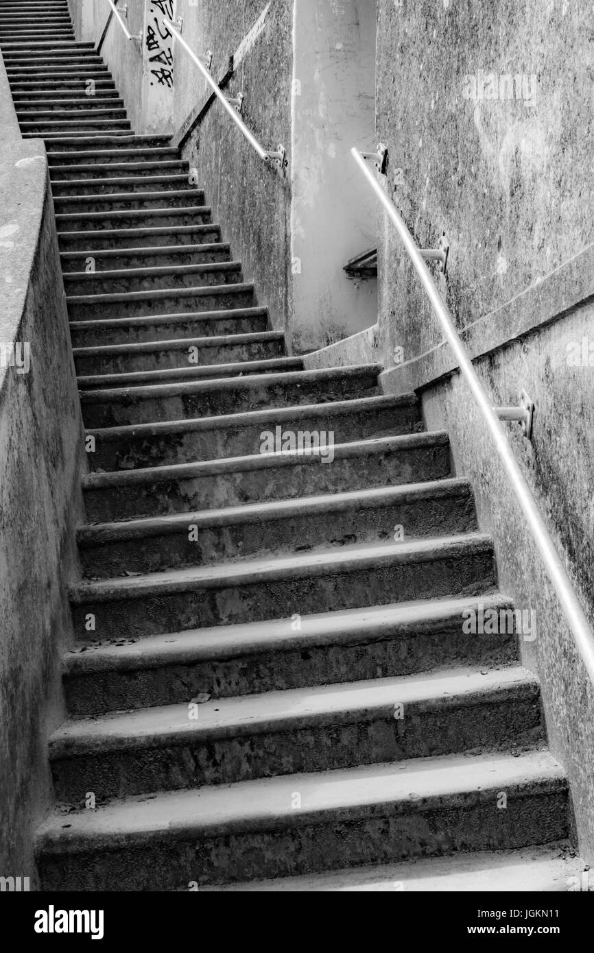Black and white version of image of the series of concrete steps at Newquay harbour in Cornwall - metaphor for many concepts relating to 'upwards'. Stock Photo