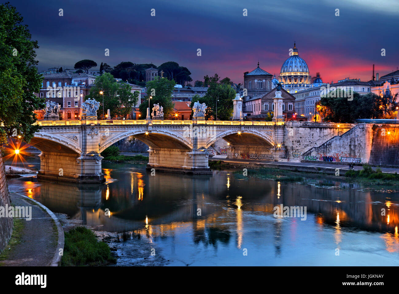 The dome of St Peter's Basilica and Ponte Vittorio Emanuele II, as seen from Ponte Sant'Angelo, Rome, Italy. Stock Photo