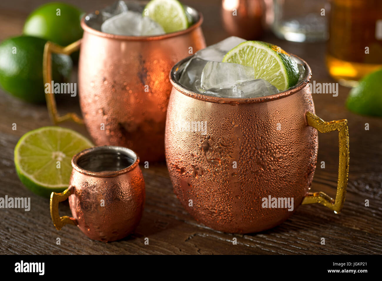 A delicious moscow mule cocktail with vodka, ginger beer, lime juice and ice. Stock Photo
