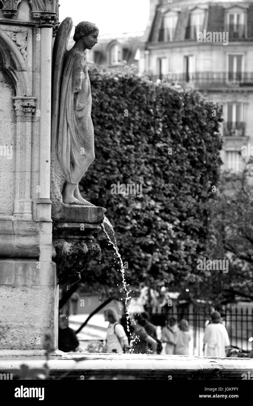 PARIS, FRANCE – 12 AUGUST 2006: The statues and architectural elements of the main facade of Notre Dame de Paris. 12 August, 2006. Paris, France. Stock Photo