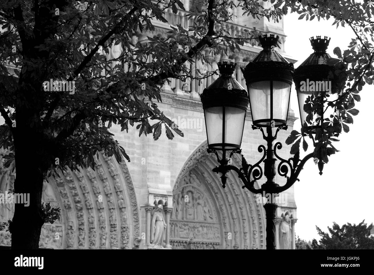 PARIS, FRANCE – 12 AUGUST 2006: The statues and architectural elements of the main facade of Notre Dame de Paris. 12 August, 2006. Paris, France. Stock Photo